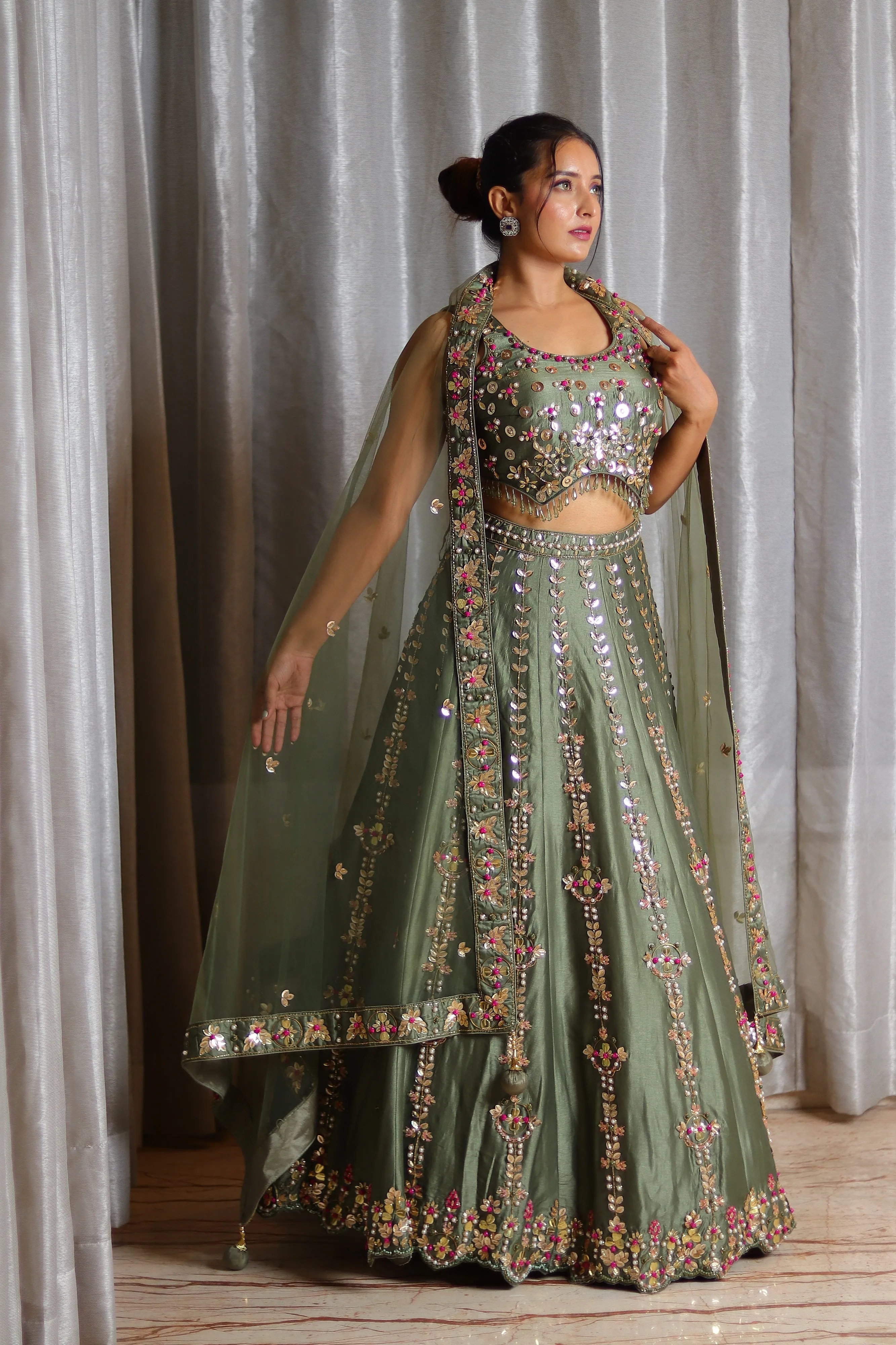 Gold Hand-Embroidered Designer Silk Lehenga with Multi-Color Metal and Thread Work