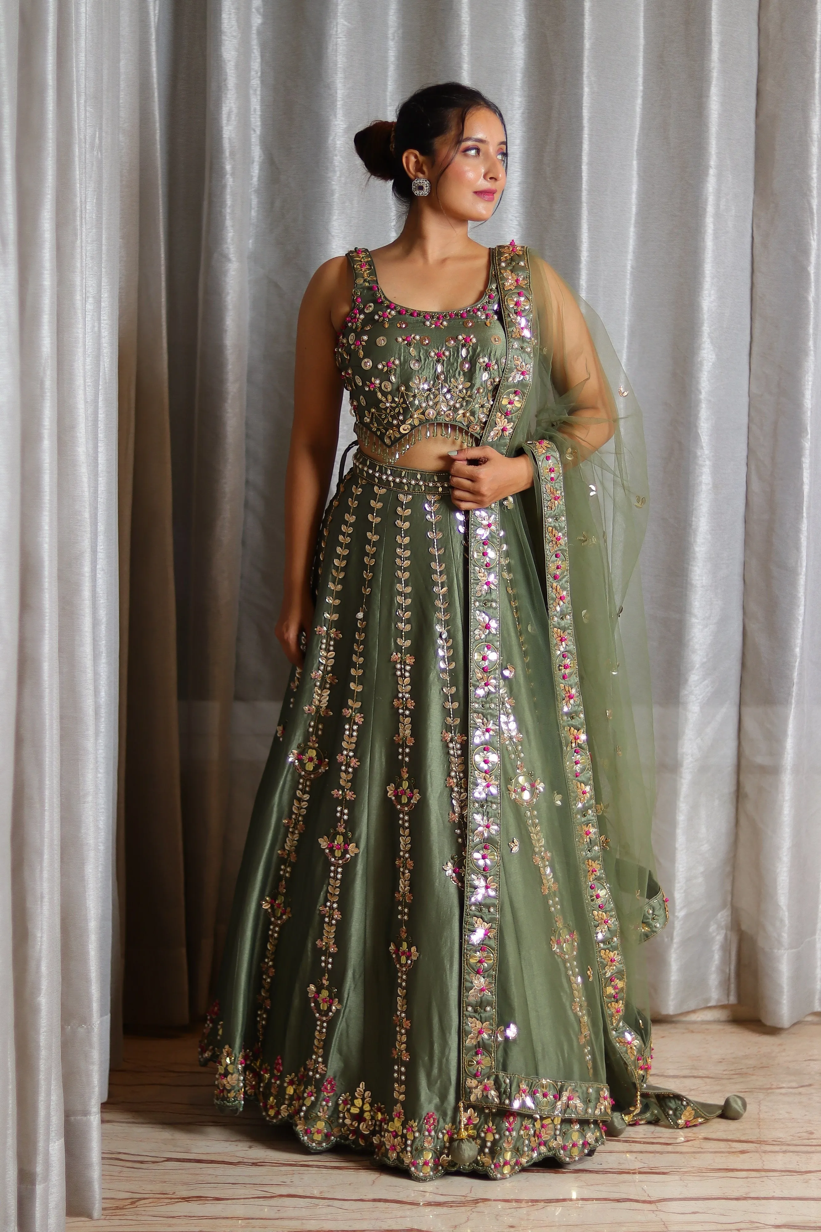 Gold Hand-Embroidered Designer Silk Lehenga with Multi-Color Metal and Thread Work