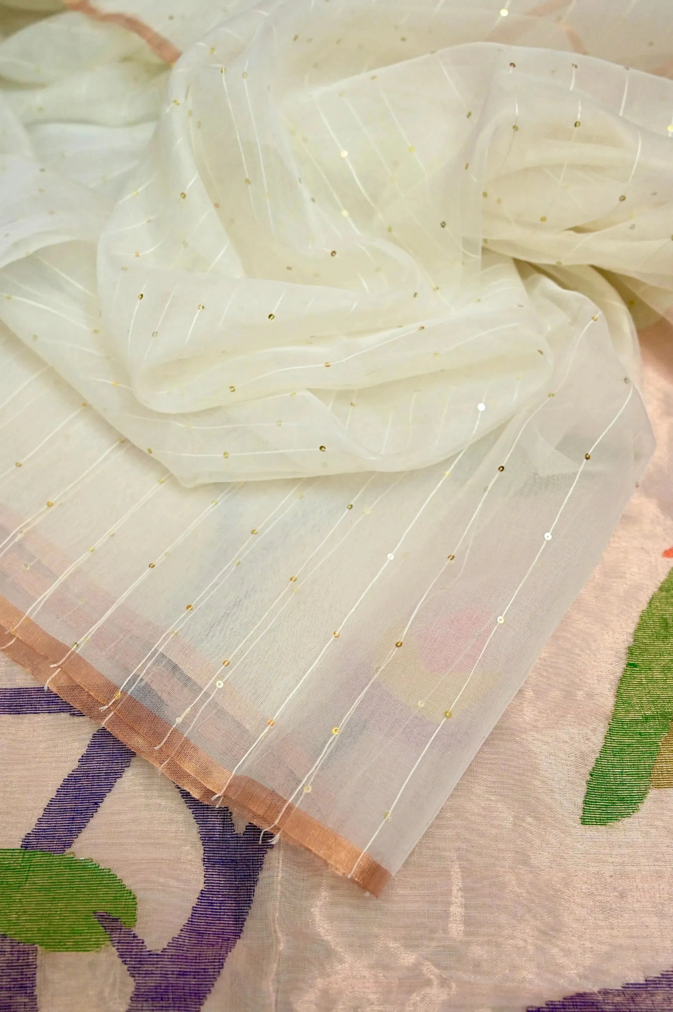 Offwhite Color Muslin Saree with Allover Sequin Work and Paithani Work Pallu